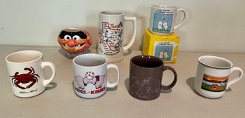 A Group Of Seven Ceramic Humorous Mugs