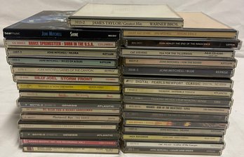 Collection Of Rock And Folk CDs Including Joni Mitchell, Genesis And Bruce Springsteen