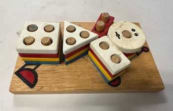 Wooden Geometric Stacker With Multicolours.                                                        C2