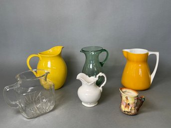 A Colorful Collection Of Pretty Pitchers/Creamers