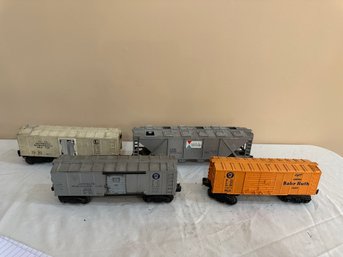 Four Lionel Box Cars - 3454, 6034, 3472, 6346