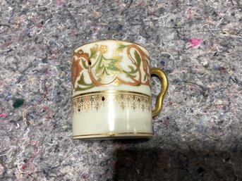 French Demitasse Cup With Gilt And Raised Patterned Decoration