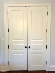 A Pair Of Solid Wood Closet Doors With Trim - With Baldwin Hardware BR