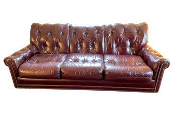 Three Seat Tufted Back Leather Sofa With Nailhead Trim.