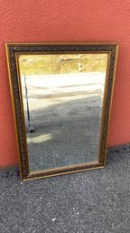 A Classic Framed Beveled Wall Mirror