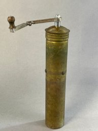 An Antique Brass Grinder