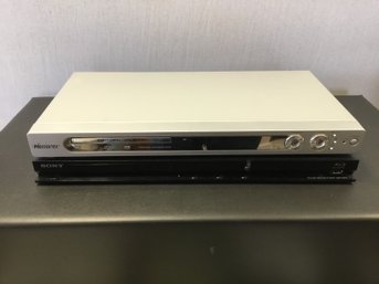 A Pair Of DVD's Player - Memorex And Blu-ray Disc By Sony