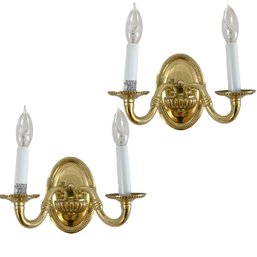 A Pair Of Polished Brass Double Light Sconces