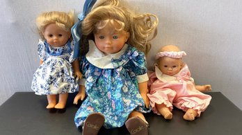 A Group Of Three Corolle Dolls