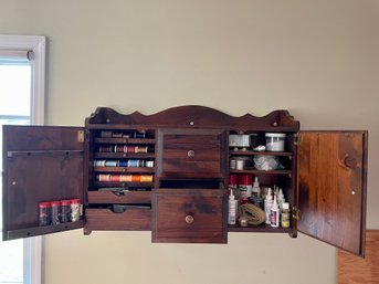 Wall Mounted Sewing Cabinet Filled With Notions