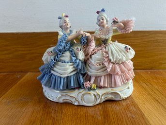 Porcelain 2 Ladys One Wearing Blue One Wearing Pink