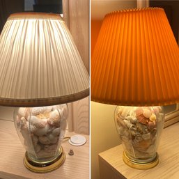 Two Glass Lamps Filled With Shells