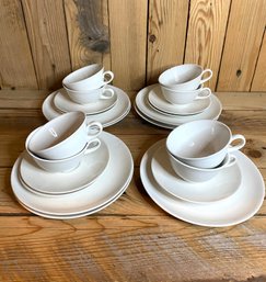 White Cups And Saucers With Dessert Plates