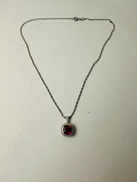 Costume Silver Chain With Beautiful Red Colored Stone Set In A Halo Of Clear Stones