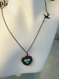 Metal Necklace With Birds Nest Design And Blue Bead Eggs