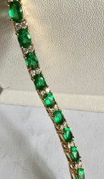 PRETTY GREEN AND WHITE STONE GOLD TONE BRACELET