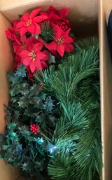 Holiday Greenery And A Poinsettia Centerpiece