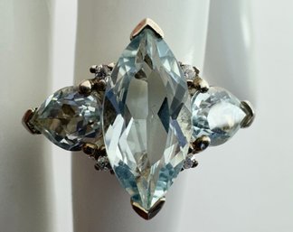 PRETTY STERLING SILVER MARQUISE AND TEAR DROP SHAPED LIGHT BLUE GEMSTONE RING