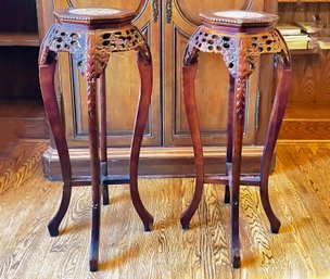 A Pair Of Vintage Carved Mahogany Plant Stands With Inset Marble Tops