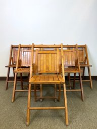 A Sextuplet Of Antique Wooden Slat Folding Chairs