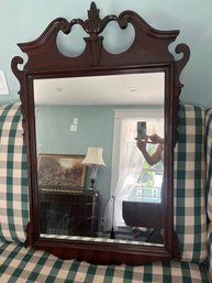 An Antique Mahogany Scrolled Wood Mirror