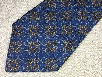 Beautiful HERMES Silk Tie - Made In France - #760 - Blue & Gold Interlocking Rings Design - Very Nice Tie !