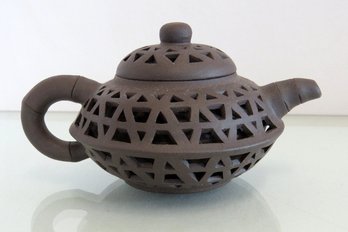 A Brown Unglazed  Earthenware Petite Chinese Tea Pot
