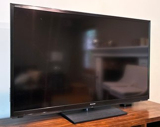 A 58 Inch Sharp Aquos Flat Screen TV