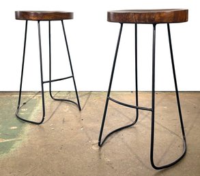 A Pair Of Modern Forged Iron And Elm Wood Bar Stools