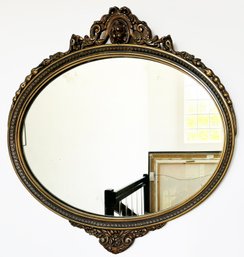 A Gilt Framed Mirror, Oval, C. 1920's