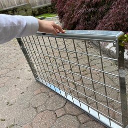 A Stainless Steel Hanging Pot Rack