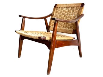 A Vintage Mid Century Danish Modern Sling Arm Chair With Jute Webbing, In Style Of Hans Wegner