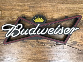 A Large Neon Budweiser Beer Sign