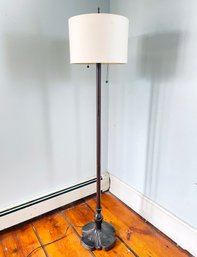 A Bronze Standing Lamp