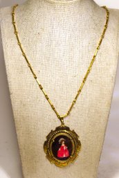 Dated 1972 Signed Betty ..... Gold Tone Necklace W Miniature Wood Doll Cameo Pendant