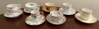 Seven Tea Cups And Saucers