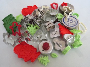 A Grouping Of Metal And Plastic Cookie Cutters