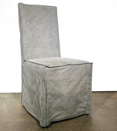 An Uttermost Armless Dining Chair