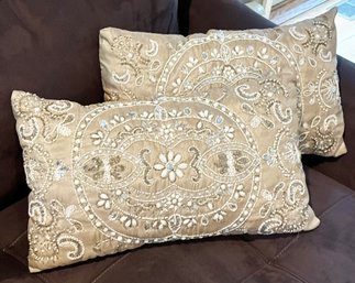 A Pair Of Beaded Accent Pillows