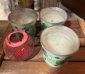 Set Of Three Off Citronella Bucket Candles And One Pink Birds Hanging Basket.