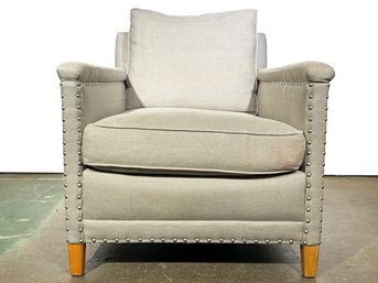 An Accent Chair By Williams-Sonoma In Linen With Nail Head Trim