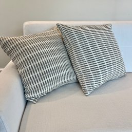 A Pair Of Cotton Pillows With Down Inserts