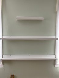 A Set Of 3 White Shelves