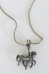 A Lovely Sterling Silver Necklace With Carousel Horse Pendant
