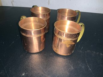 Four Copper Mugs