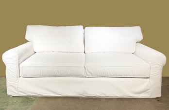 A White Linen Coastal Sofa By Pottery Barn - Easy To Get Slip Covers!