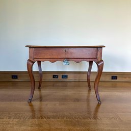 An Antique Walnut French Provincial  Side Table With Cabriolet Legs