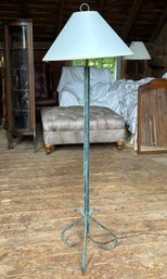 A Faux Distressed Wrought Iron Floor Lamp