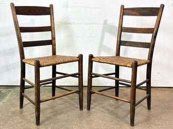 A Pair Of Antique Rush Seated Ladder Back Chairs