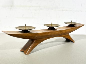 A Sleek Mid Century Scandinavian Modern Pillar Candle Centerpiece In Teak And Brass